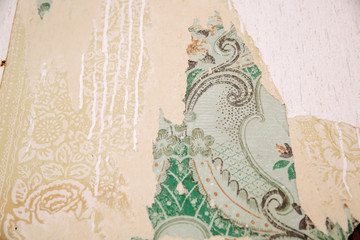 Vintage, old wallpaper, dripping paint, layers of different colorful paper backgrounds.
