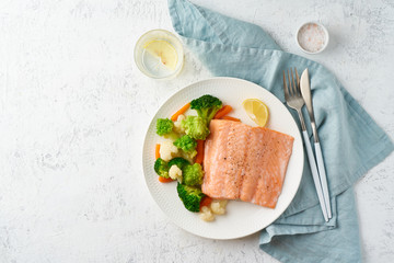 Steam salmon and vegetables, Paleo, keto, fodmap, dash diet. Mediterranean diet with steamed fish