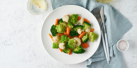 Mix of boiled vegetables. Broccoli, carrots, cauliflower. Steamed vegetables for low-calorie diet