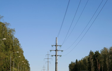 a power line pole against a blue sky