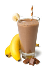 Chocolate banana smoothie in a glass with ingredients isolated on white background - 348242564