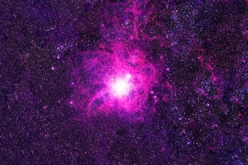 A pink galaxy in deep space. Elements of this image were furnished by NASA.