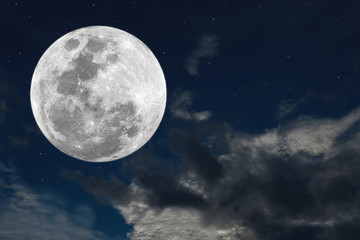 Obraz na płótnie Canvas Full moon and clouds in the sky.