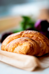 Croissant and tulips
