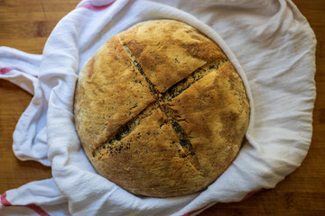 homemade bread with sesame seeds on the table