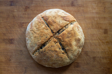 homemade bread with sesame seeds on the table