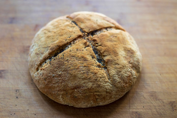 homemade bread with sesame seeds on the table