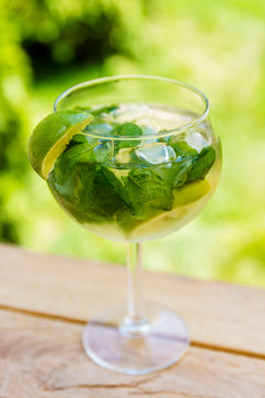 cocktail with lime mint and ice mojito without straw
