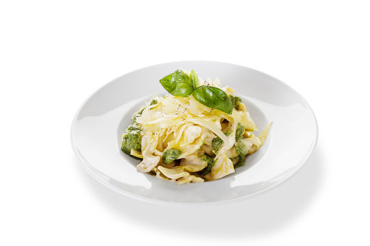 Basil Pesto Pasta, parmesan and basil leaf isolated white background