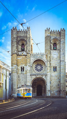 Lisbon cathedral with tram infront
