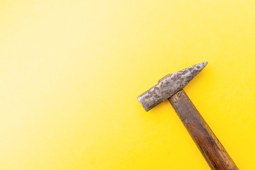 Old Hammer Isolated on a yellow background