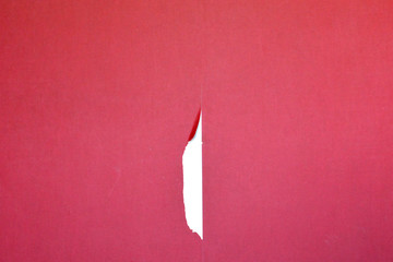 wall with old burgundy wallpaper. Repair in an apartment