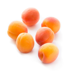 Colorful group of fresh apricot fruits isolated on white background