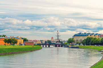 Kronverksky Strait channel between Zayachy Hare and Petrogradsky Island with Kronverk bridge, oats...