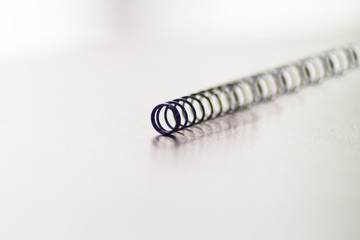 Small wire spring of a ballpoint pen