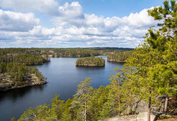 Fototapeta na wymiar View of The Repovesi National Park from Katajavuori Hill, lake and rocks, Kouvola, Finland