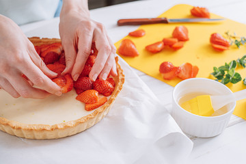 woman cook preparing a quiche with custard