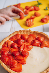 woman cook preparing a quiche with custard