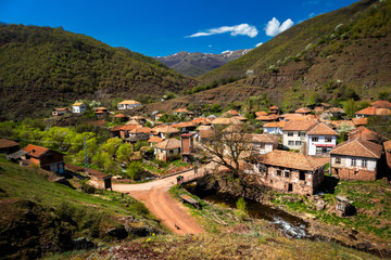 Fototapeta premium Old rustic idyllic houses in a village Topli do on Old Mountain (stara planina) in Serbia