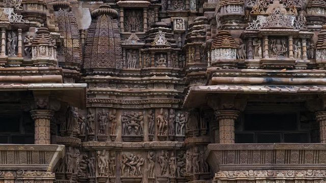Erotic sculptures at the Parshvanatha temple, within the Khajuraho Group of Monuments in the Chhatarpur district, Madhya Pradesh, India, Asia