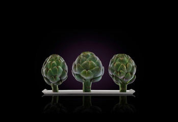 artichokes on plate, front view,