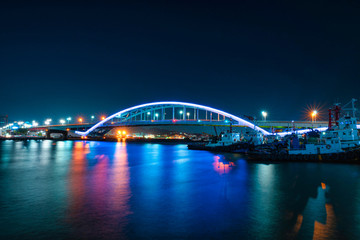 Busandaegyo Bridge at night in Jung-gu, Busan, South Korea.