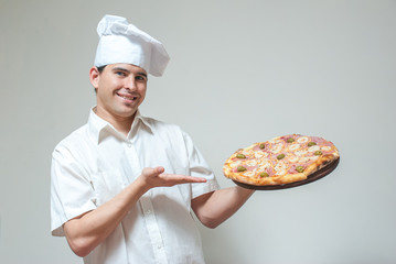 portrait cook with pizza on a light background