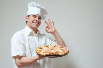 portrait cook with pizza on a light background