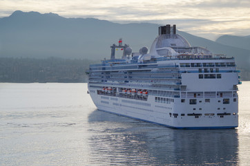 Modern white Princess Cruises cruiseship or cruise ship liner Island Princess arrival into port of...