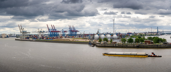 Panorama of a container terminal and industrial facilities in the port of Hamburg