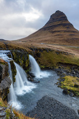 Fototapeta premium Kirkjufell mountain and kirkjufellsfoss waterfall