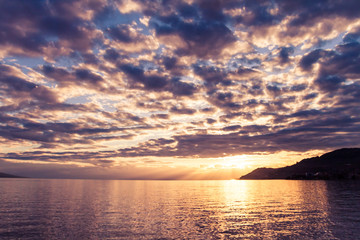 Cloudy Sunset over Lake Leman Clear Waters and Vevey Riviera