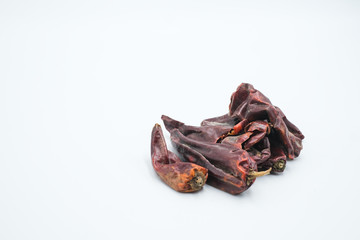 Dried chilli or chili shot in a white isolated background