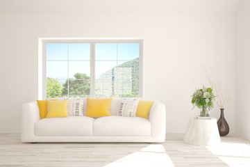 White living room with sofa and summer landscape in window. Scandinavian interior design. 3D illustration