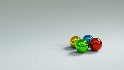 Farbige Chrom Kugeln auf hellgrauem Untergrund