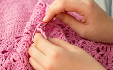 Obraz na płótnie Canvas Knitted lace, crochet, knitting hook.