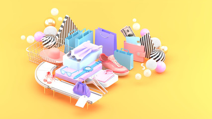 Dresses, wristwatches, glasses, handbags, high heels and sneakers surrounded by shopping bags and colorful balls on an orange background.-3d rendering..