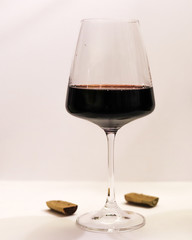 beautiful isolated glass of red wine on a white background