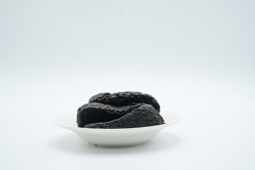 chocolate moist cake shot on a white isolated background.
