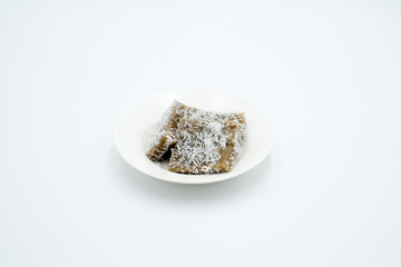 Kuih kusui, a traditional malay cuisine shot on a white isolated background.