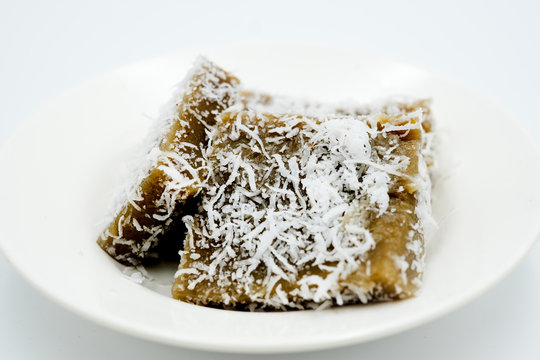 Kuih kusui, a traditional malay cuisine shot on a white isolated background.