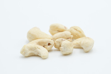 Cashew nut shot on a white isolated background.