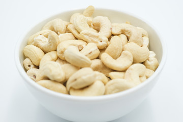 Cashew nut shot on a white isolated background.