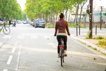 young woman riding a bike