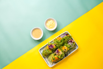 Fototapeta na wymiar The Fresh Vegetable Salad on dual colour background.