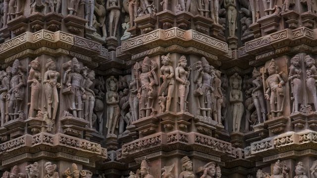 Erotic sculptures at the Parshvanatha temple, within the Khajuraho Group of Monuments in the Chhatarpur district, Madhya Pradesh, India, Asia
