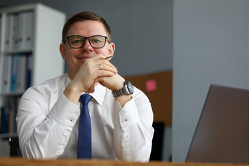 Cheerful man in presentable suit