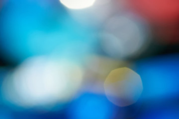 Color bokeh lights on a dark background.