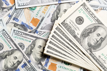 heap of US Dollar bills, money background. Top view of business concept on background with copy space
