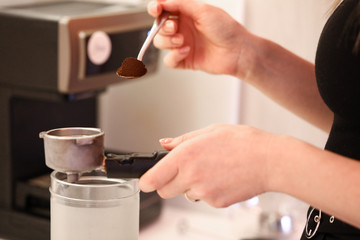 Female make delicious cappuccino